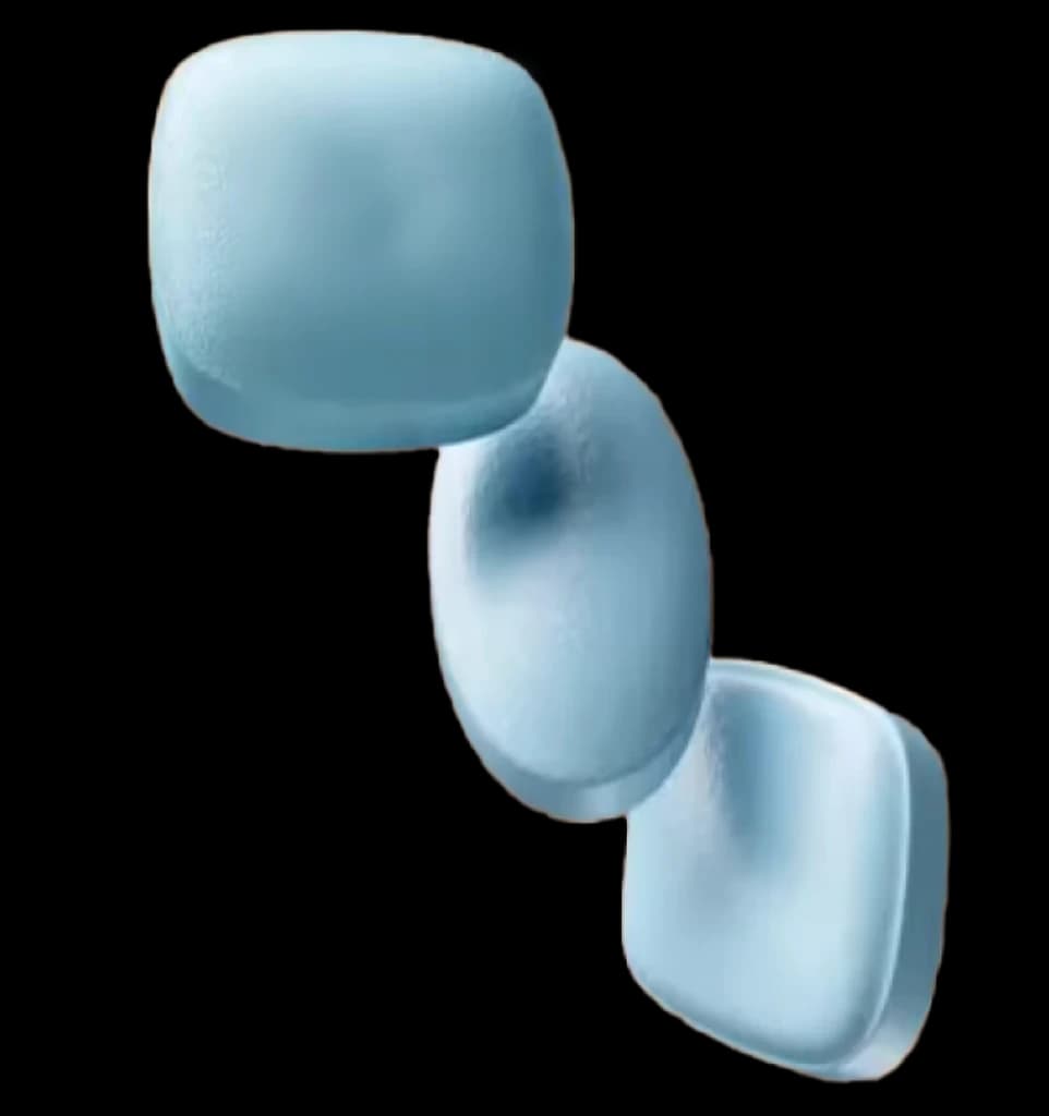 Three softly rounded blue glass forms